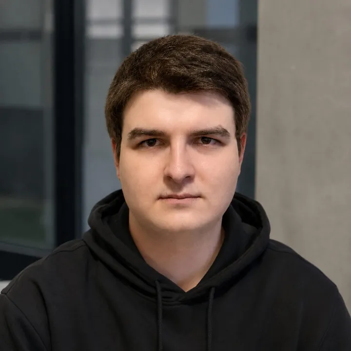 Portrait of Alexander in a black hoodie
